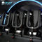 Três da cabina do piloto completa do simulador do movimento VR dos jogadores jogo super da montanha russa da rotação